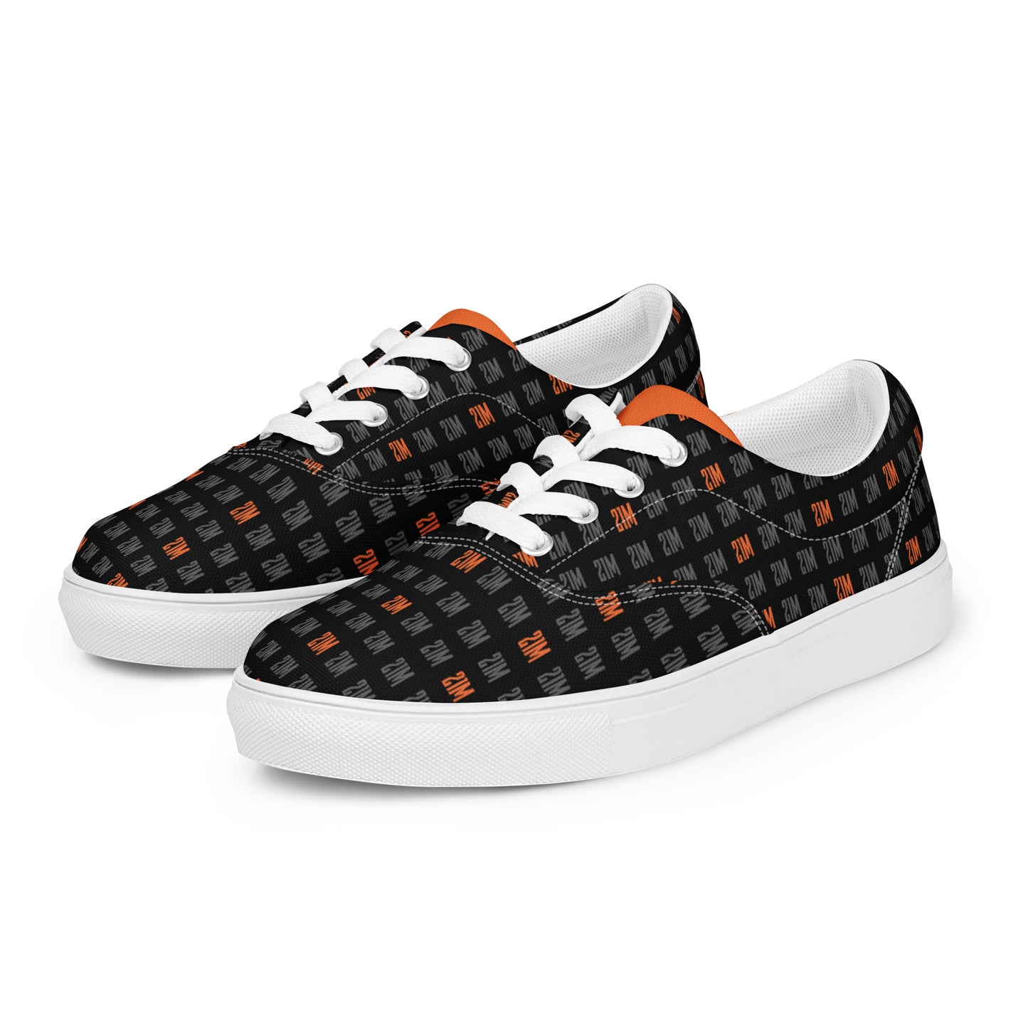 Black sneakers with orange 21 million pattern and white soles on a white background
