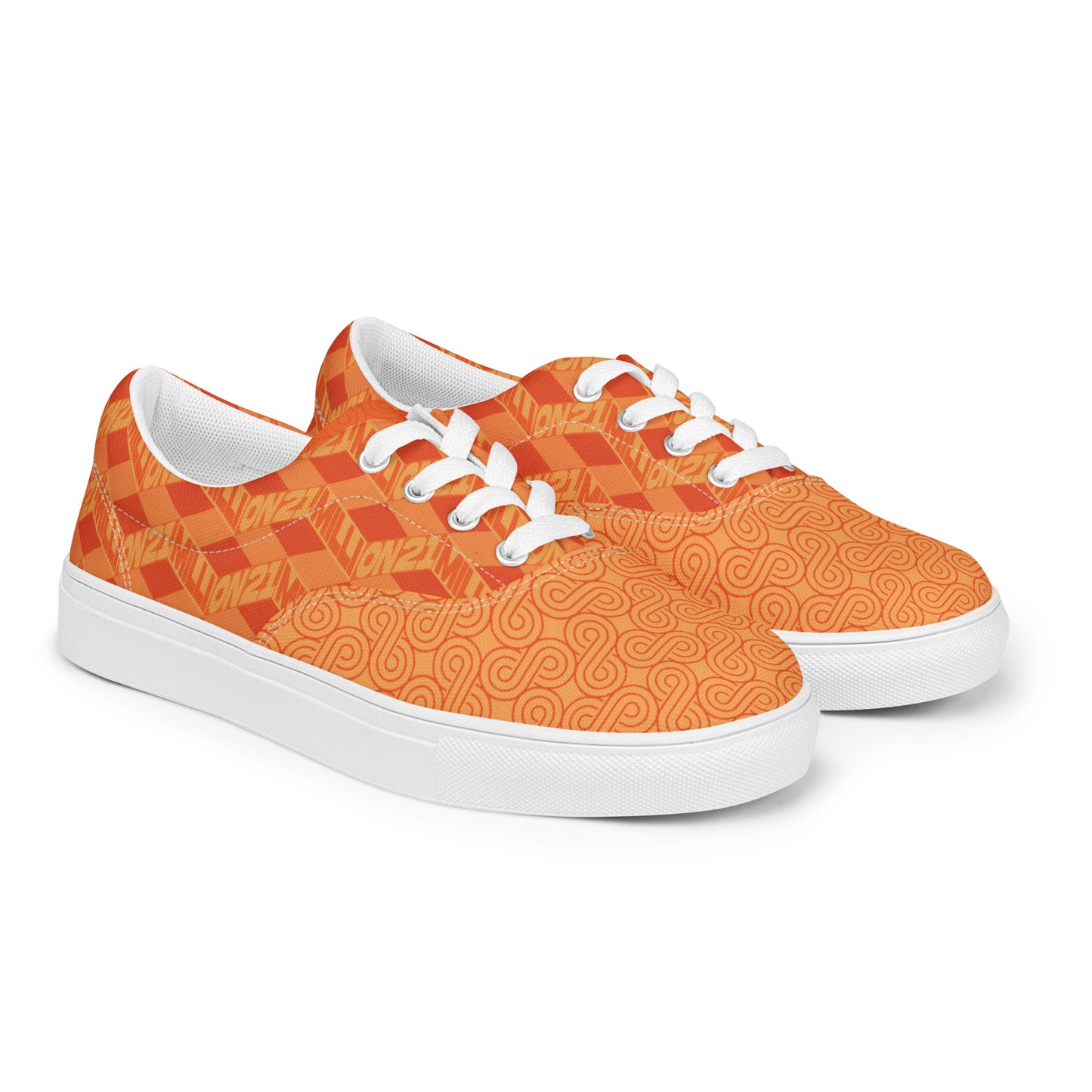 Orange patterned sneakers with white laces on a white background