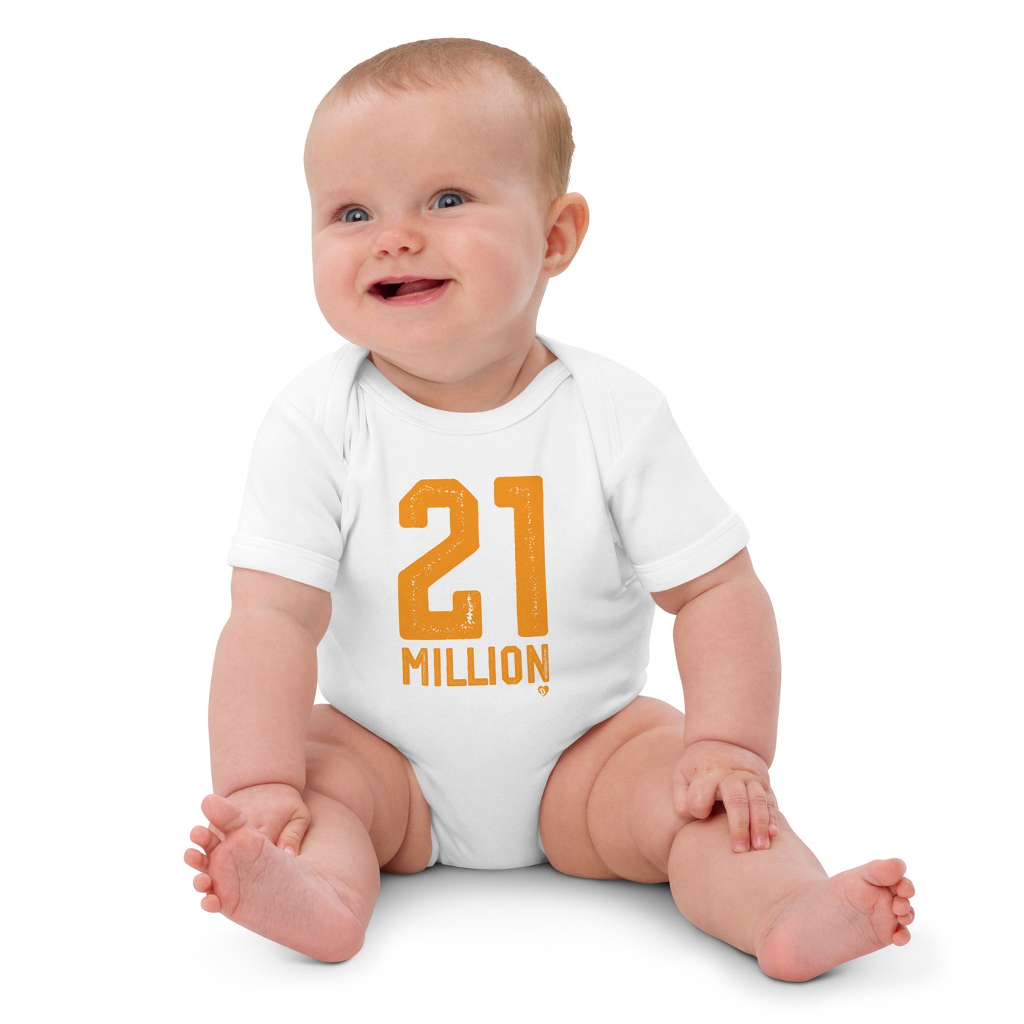 Baby wearing a white onesie with '21 MILLION' printed in orange on a white background
