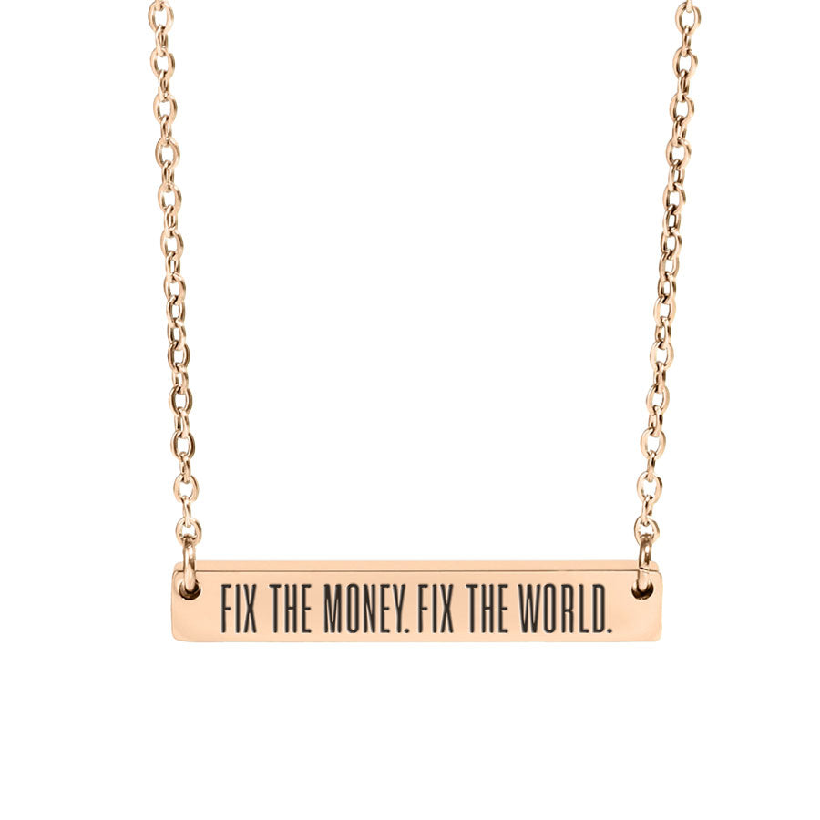 Rose gold necklace with engraved bar fix the money. fix the world. pendant on a white background