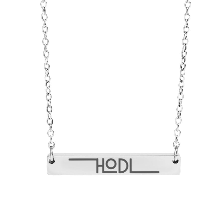 Silver necklace with a bar pendant displaying 'HODL' on a white background
