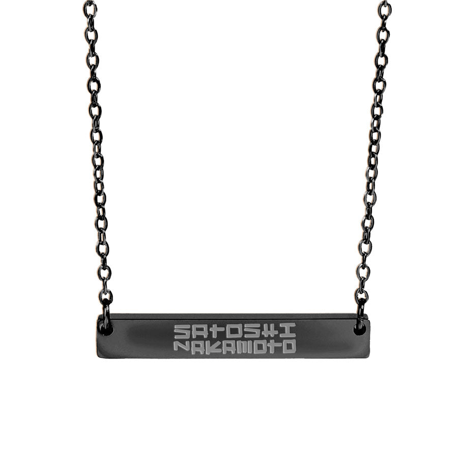 Black necklace with engraved satoshi nakamoto name on a white background