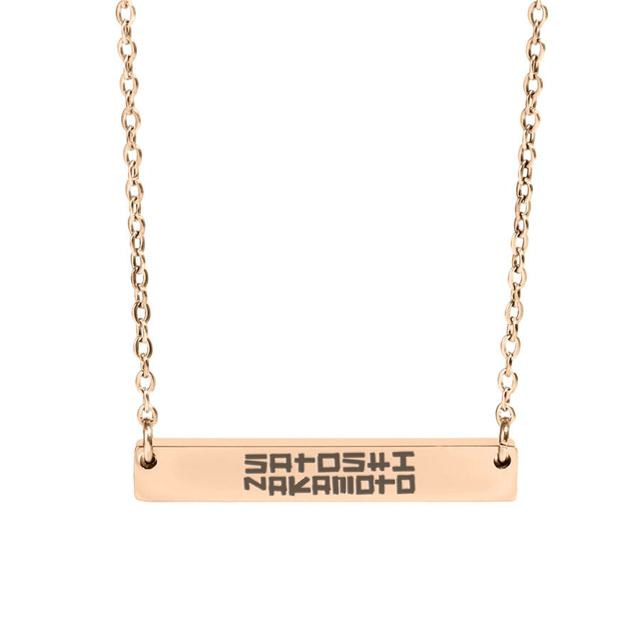 Rose gold necklace with engraved satoshi nakamoto name on a white background