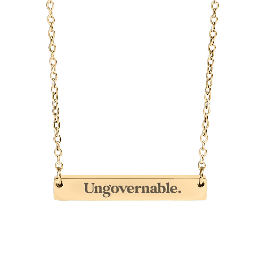 ungovernable opsec bitcoin pendant on a necklace