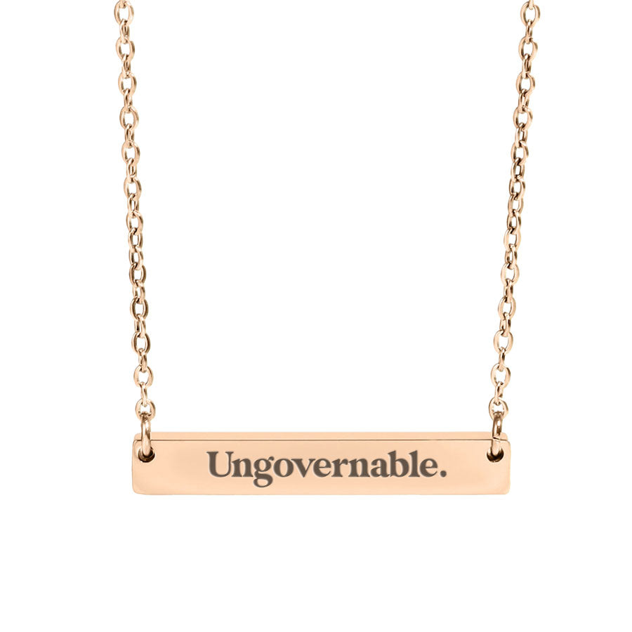 ungovernable opsec bitcoin pendant on a necklace