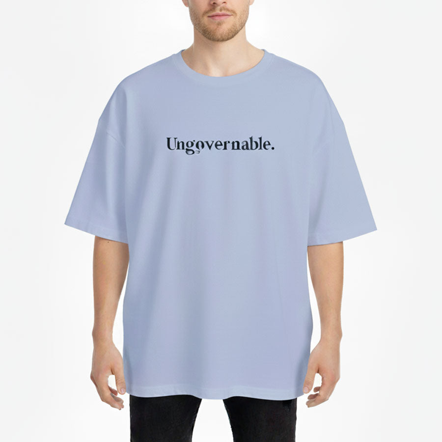 Person wearing a light blue t-shirt with 'Ungovernable.' text on a white background