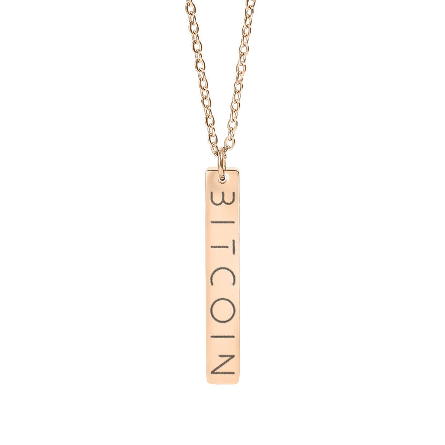 Rose gold necklace with a 'BITCOIN' pendant on a white background
