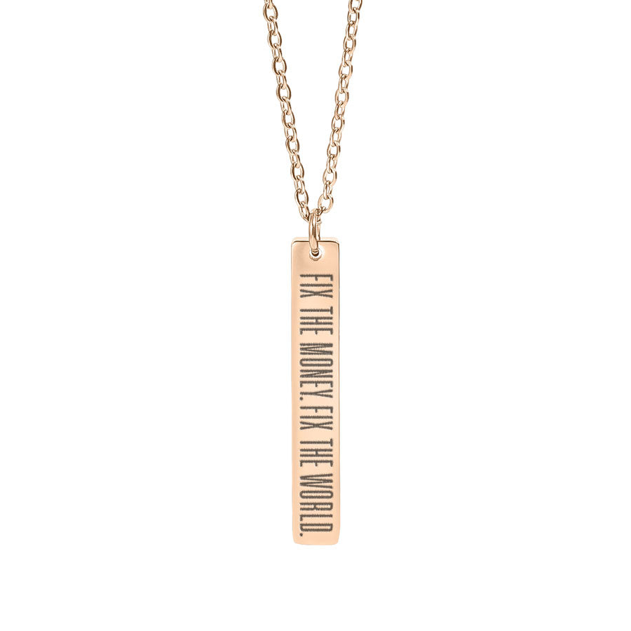 Rose gold necklace with fix the money. fix the world. a bar pendant on a white background