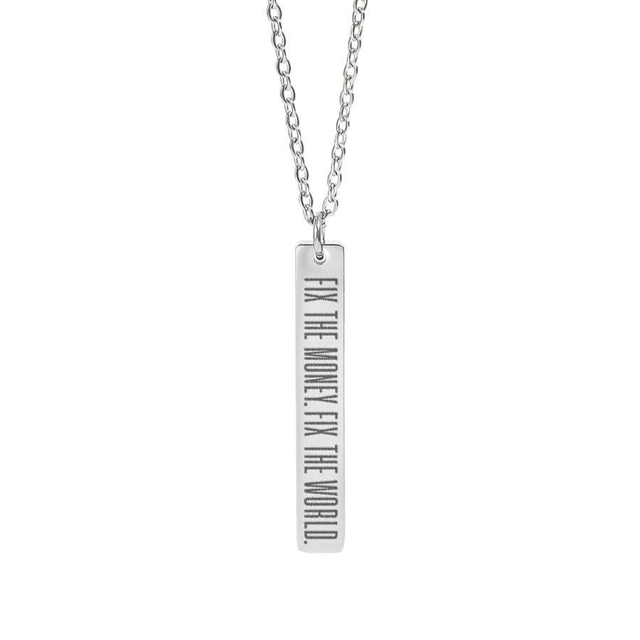 Silver necklace with fix the money. fix the world. a bar pendant on a white background