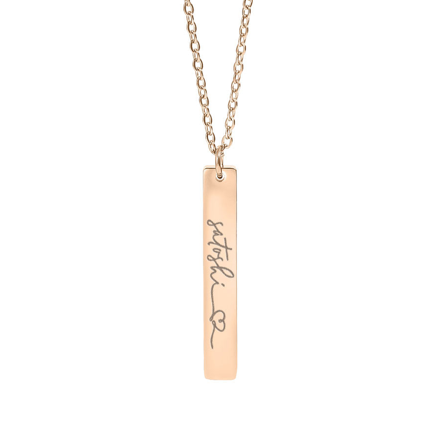 satoshi Rose gold necklace with a bar pendant on a white background