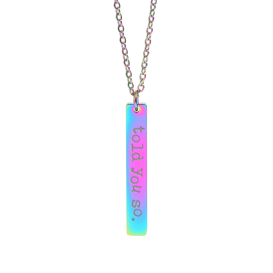 Necklace with a colorful pendant that reads 'told you so.' on a white background