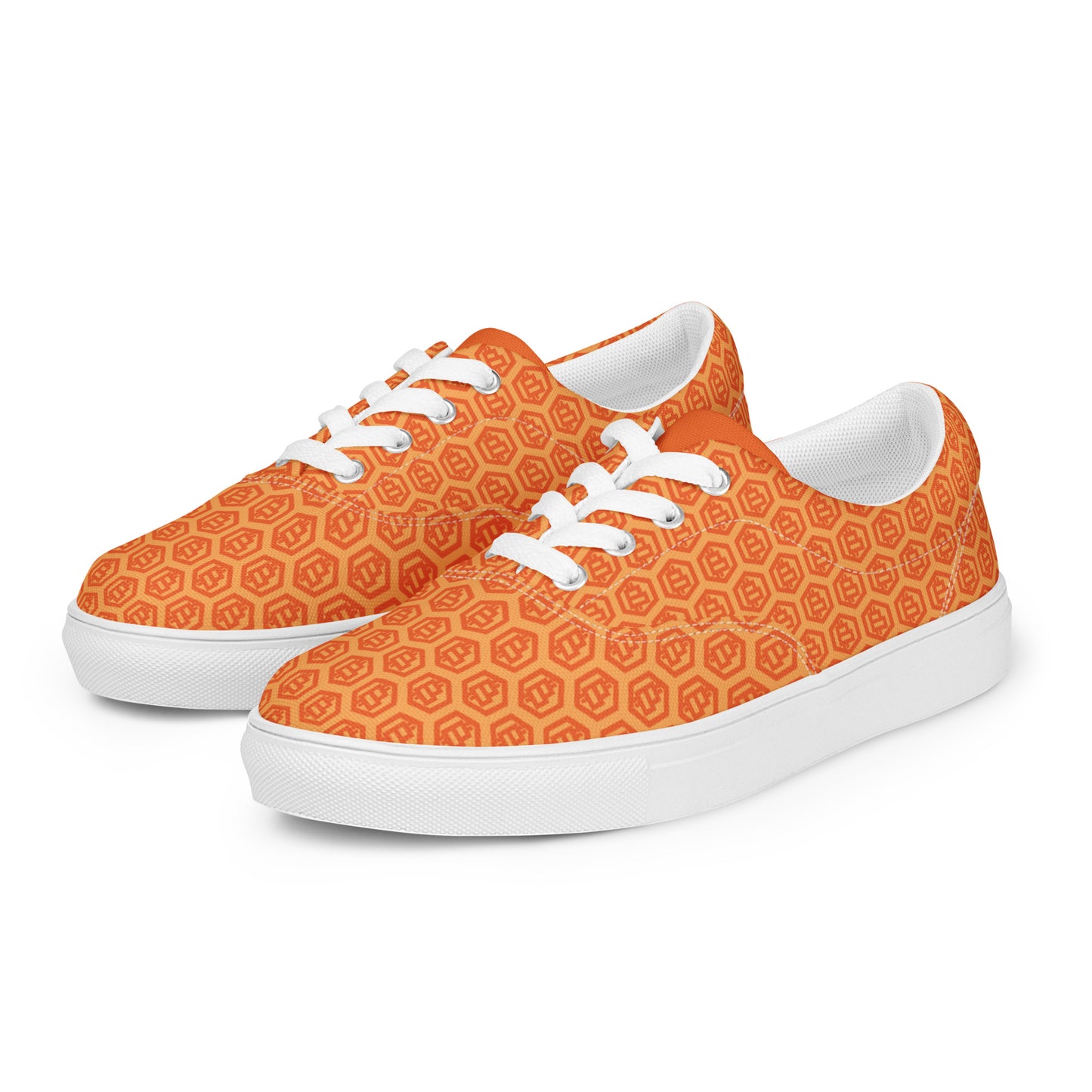 Orange patterned sneakers with bitcoin symbols white laces and soles on a white background