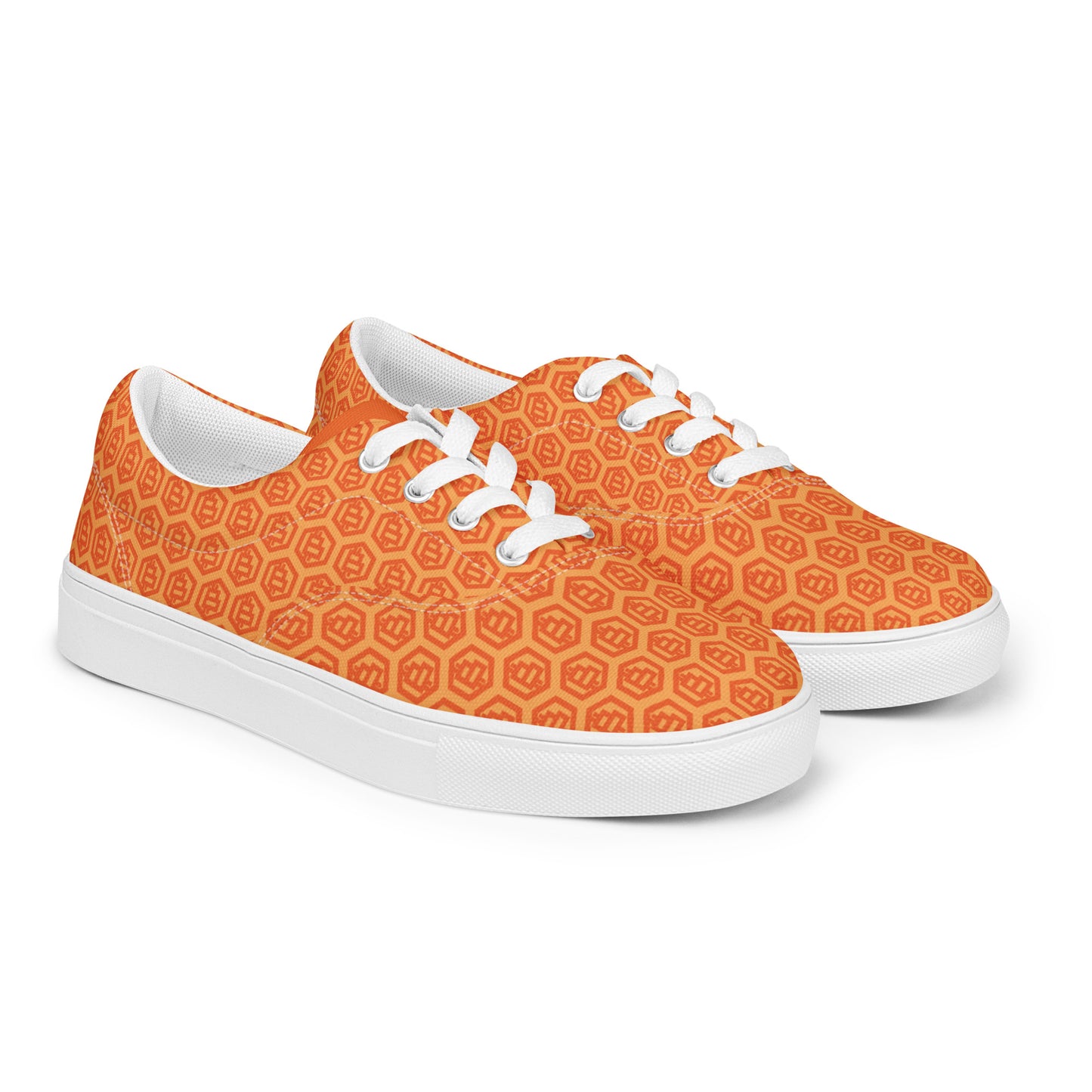 Orange bitcoin patterned sneakers with white laces on a white background