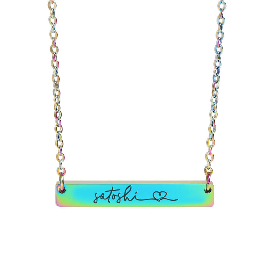 Necklace with a colorful bar pendant featuring the name 'satoshi' and a heart symbol on a white background.