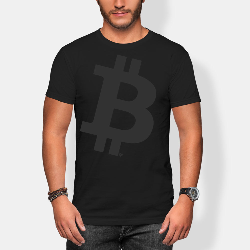 Person wearing a black t-shirt with a large massive Bitcoin symbol on a white background