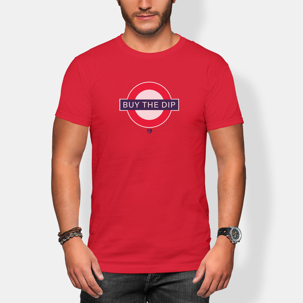 Person wearing a red t-shirt with 'BUY THE DIP' graphic design on a white background