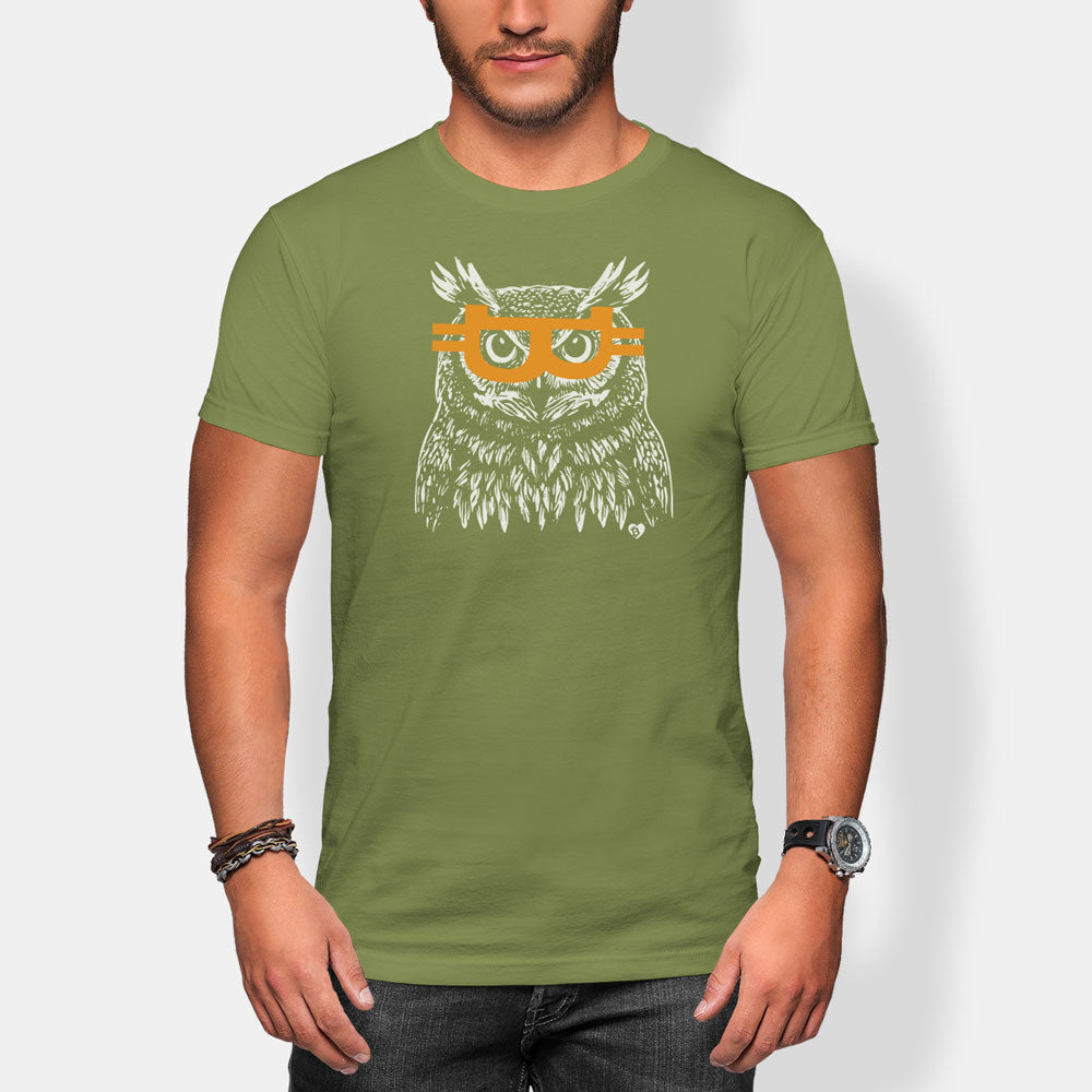 Person wearing a green t-shirt with an owl design and bitcoin glasses on a white background