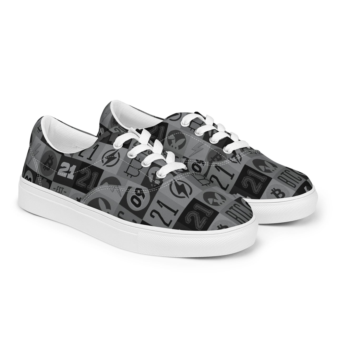 Pair of sneakers with black and gray bitcoin pattern on a white background
