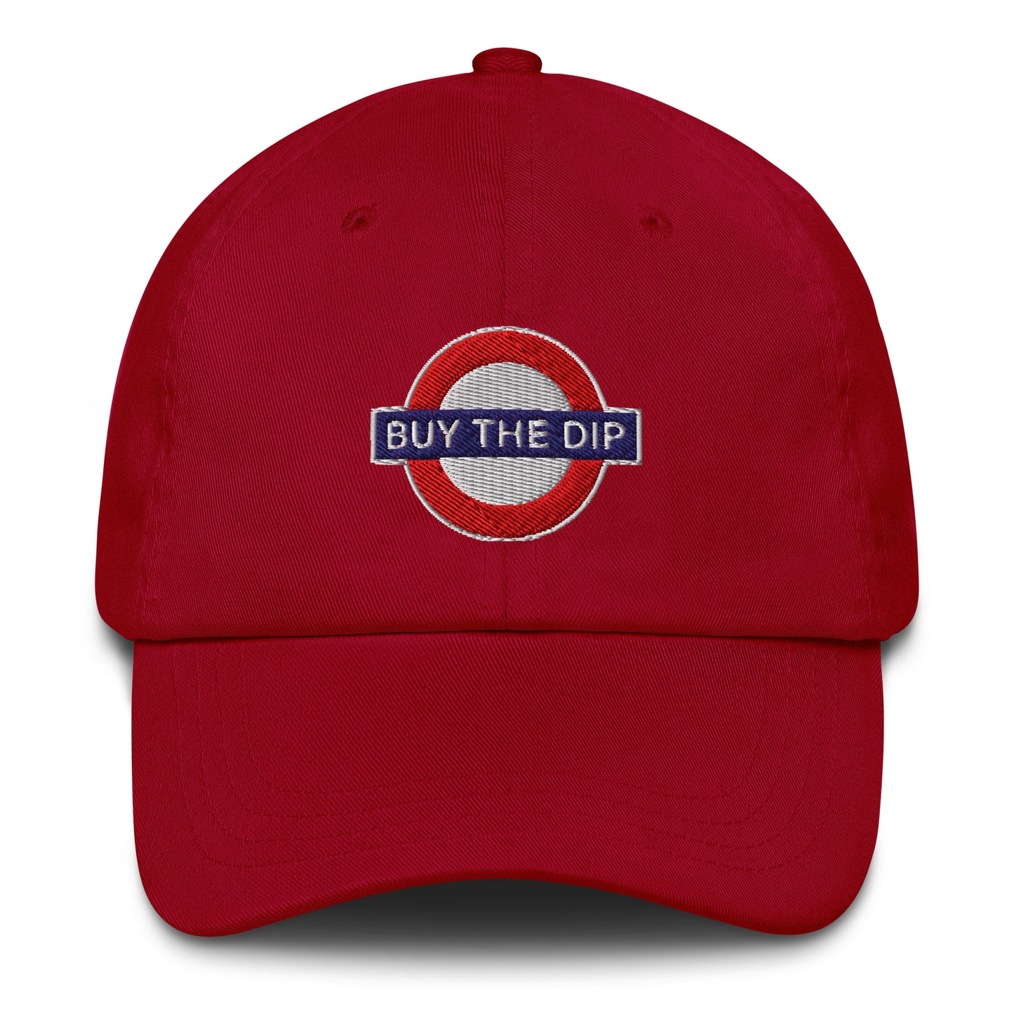 Red cap with 'BUY THE DIP' logo on a white background