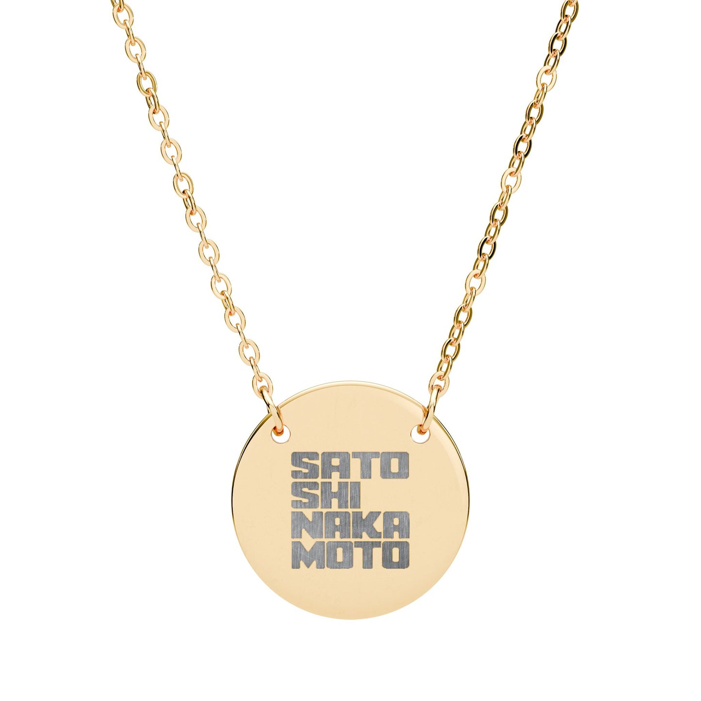 Gold necklace with a round pendant displaying engraved satoshi nakamoto text on a white background