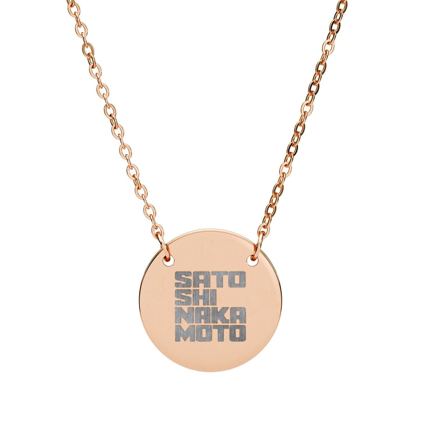 Rose gold necklace with a round pendant displaying engraved satoshi nakamoto text on a white background