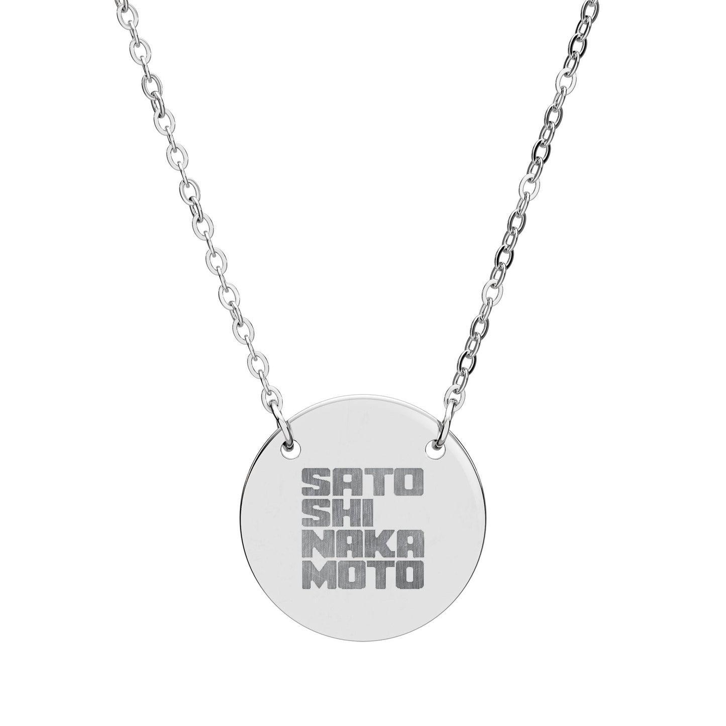 Silver necklace with a round pendant engraved with 'SATOSHI NAKAMOTO' on a white background