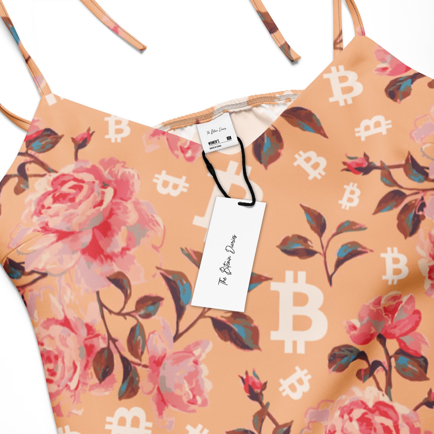 Dress with floral and Bitcoin symbol pattern on a white background