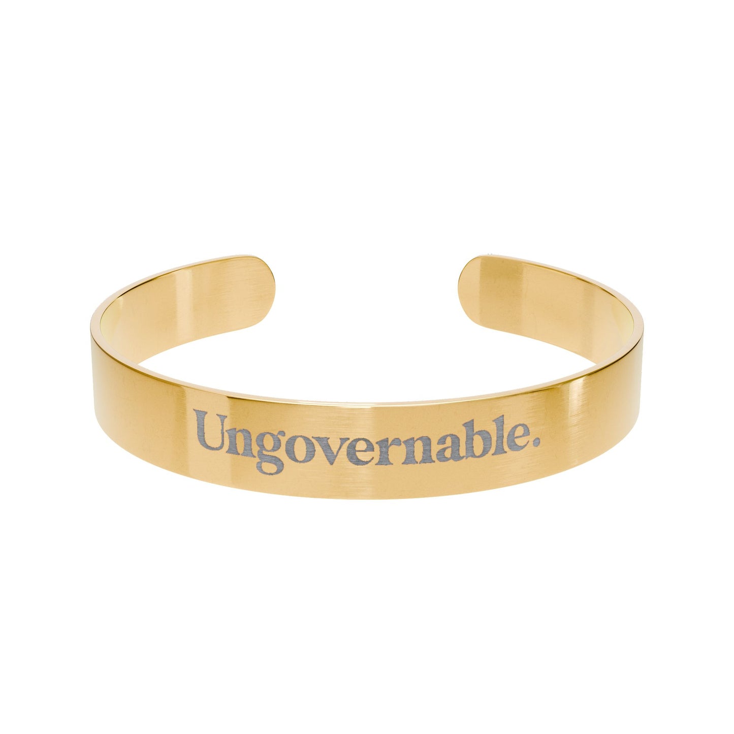 Gold bracelet with 'Ungovernable.' engraving on a white background