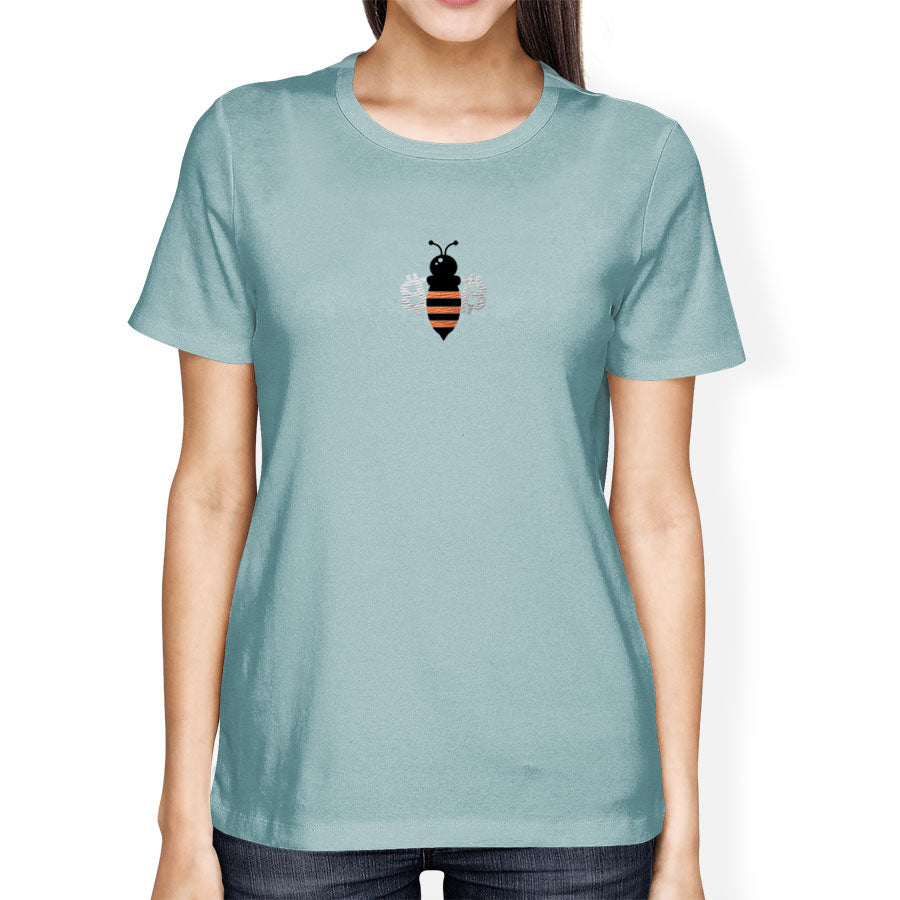 Person wearing a light blue t-shirt with a bee bitcoin design on a white background