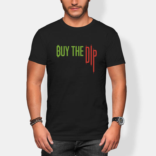 Person wearing a black t-shirt with 'BUY THE DIP' text in green and red on a white background