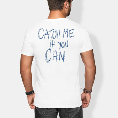 Person wearing a white t-shirt with 'Catch Me If You Can' text on the back, standing against a plain background.