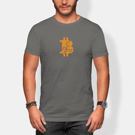 Person wearing a gray t-shirt with a Bitcoin puzzle symbol on a white background