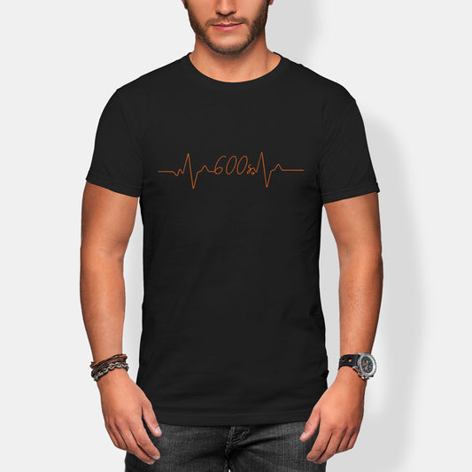 Person wearing a black t-shirt with a heart rate 600 seconds design on a white background