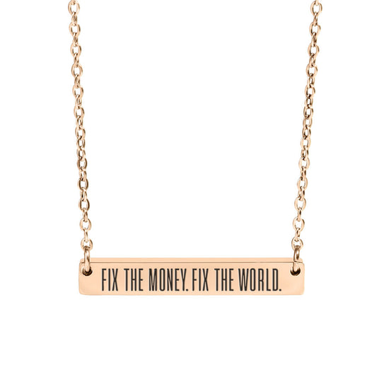 Rose gold necklace with engraved bar fix the money. fix the world. pendant on a white background