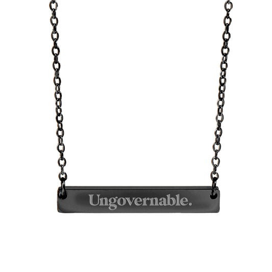ungovernable opsec bitcoin pendant on a necklace