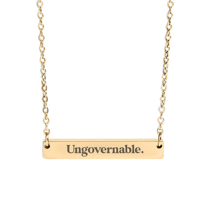 ungovernable opsec bitcoin pendant on a necklace