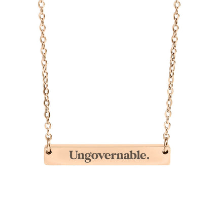 ungovernable opsec bitcoin pendant on a necklace