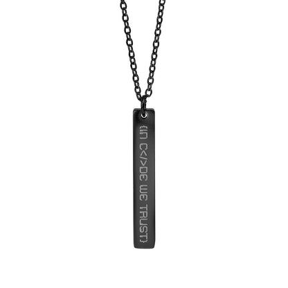 Black rectangular pendant with engraved text in code we trust on a chain against a white background