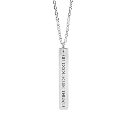 Silver necklace with a rectangular pendant in code we trust on a white background