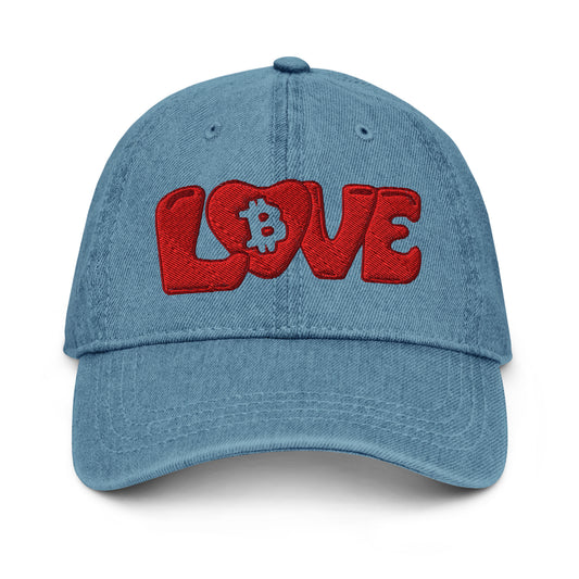 Blue denim cap with red 'LOVE' text and Bitcoin symbol on a white background