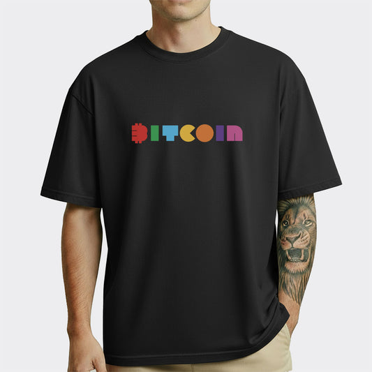 Black t-shirt with colorful 'BITCOIN' text worn by a person on a white background