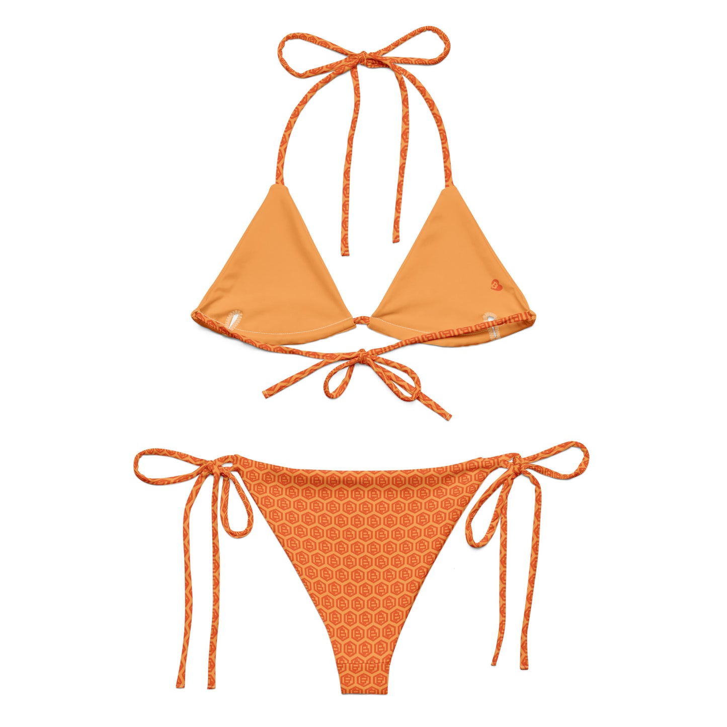Orange bikini set with geometric Bitcoin hex patterned bottom on a white background