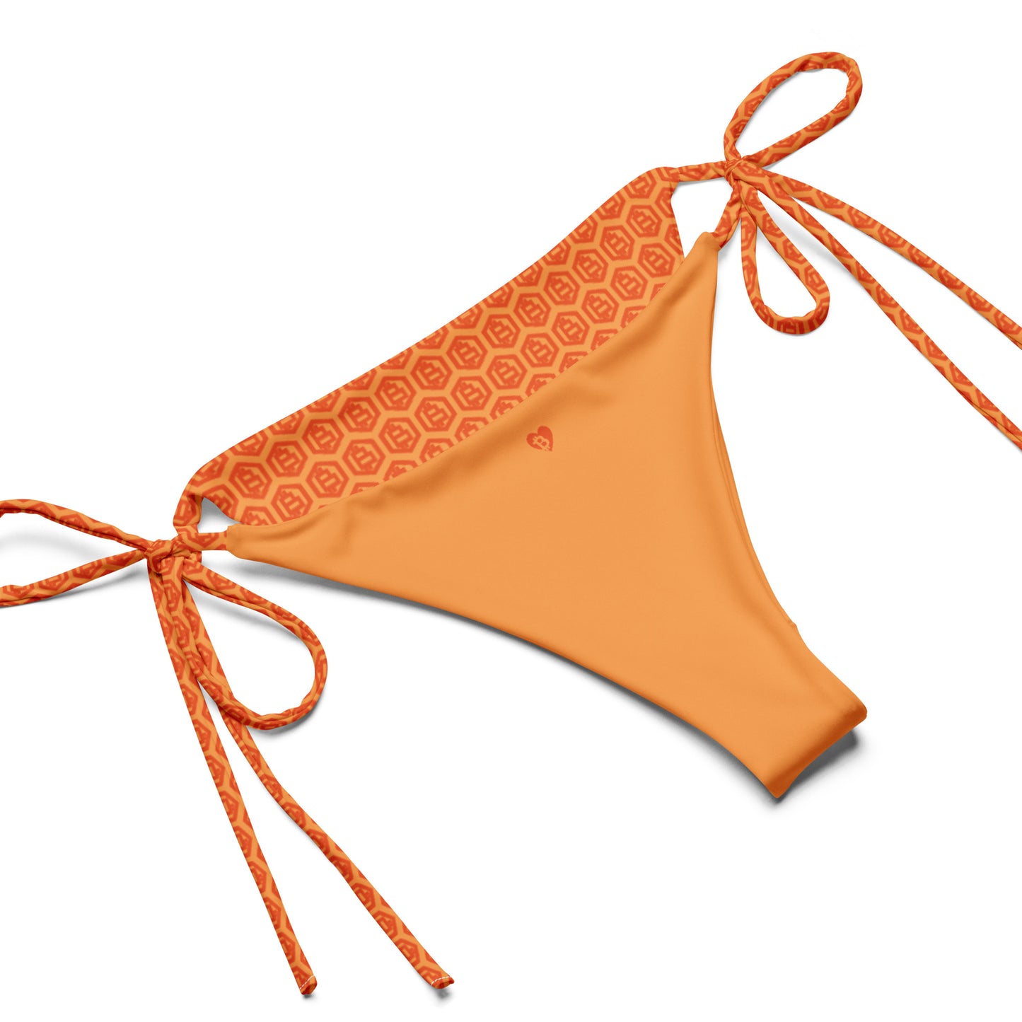 Orange bikini bottom with geometric bitcoin hex pattern on a white background