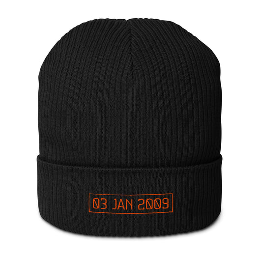 Black beanie with orange genesis block date text on a white background