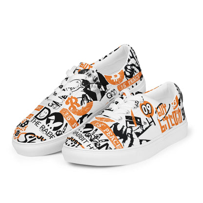 White bitcoin sneakers with black and orange graphics on a white background