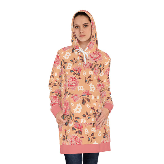 Woman wearing a bitcoin floral-patterned hooded raincoat on a white background