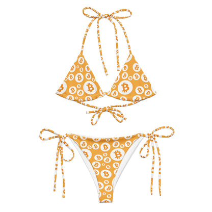 Bikini set with Bitcoin logo pattern on a white background