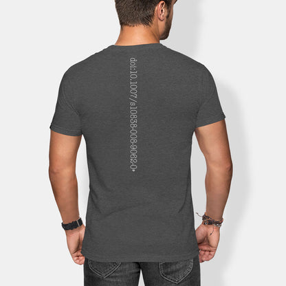 Man wearing a dark gray t-shirt with satoshi's whitepaper doi code text on the back against a white background
