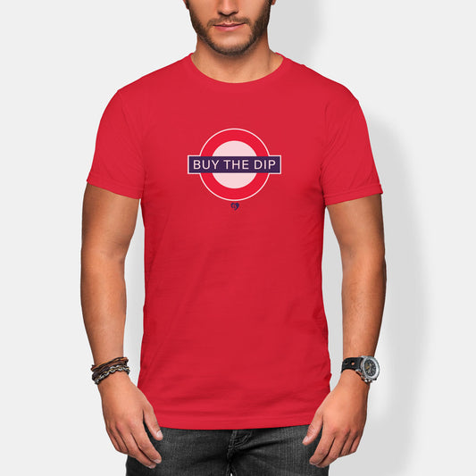 Person wearing a red t-shirt with 'BUY THE DIP' graphic design on a white background