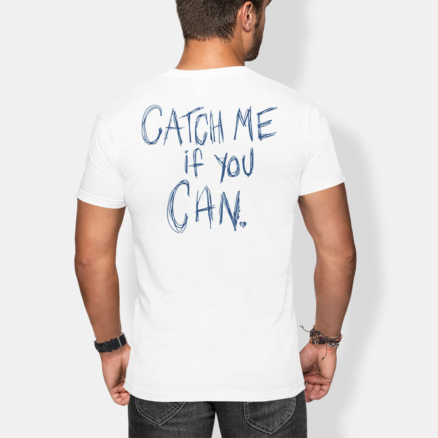 Person wearing a white t-shirt with 'Catch Me If You Can' text on the back, standing against a plain background.
